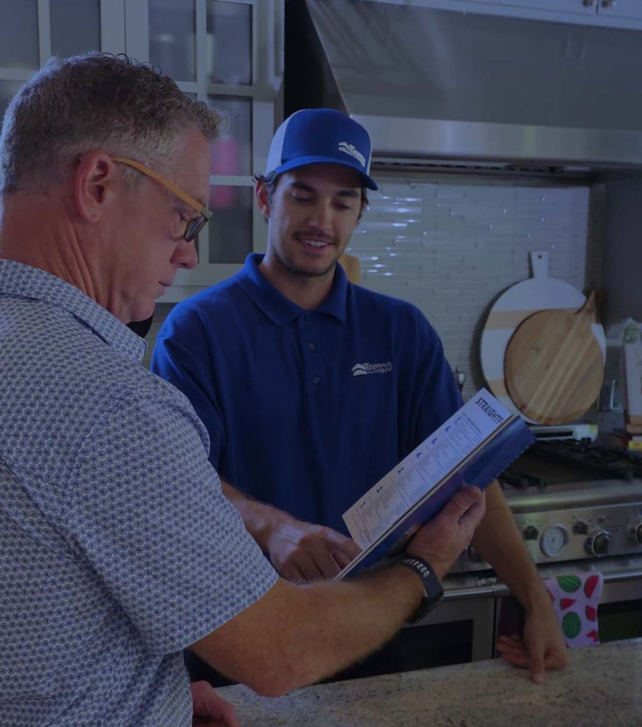 alt text="Banner showing a Tempo Air plumbing technician repairing residential pipes with service text"