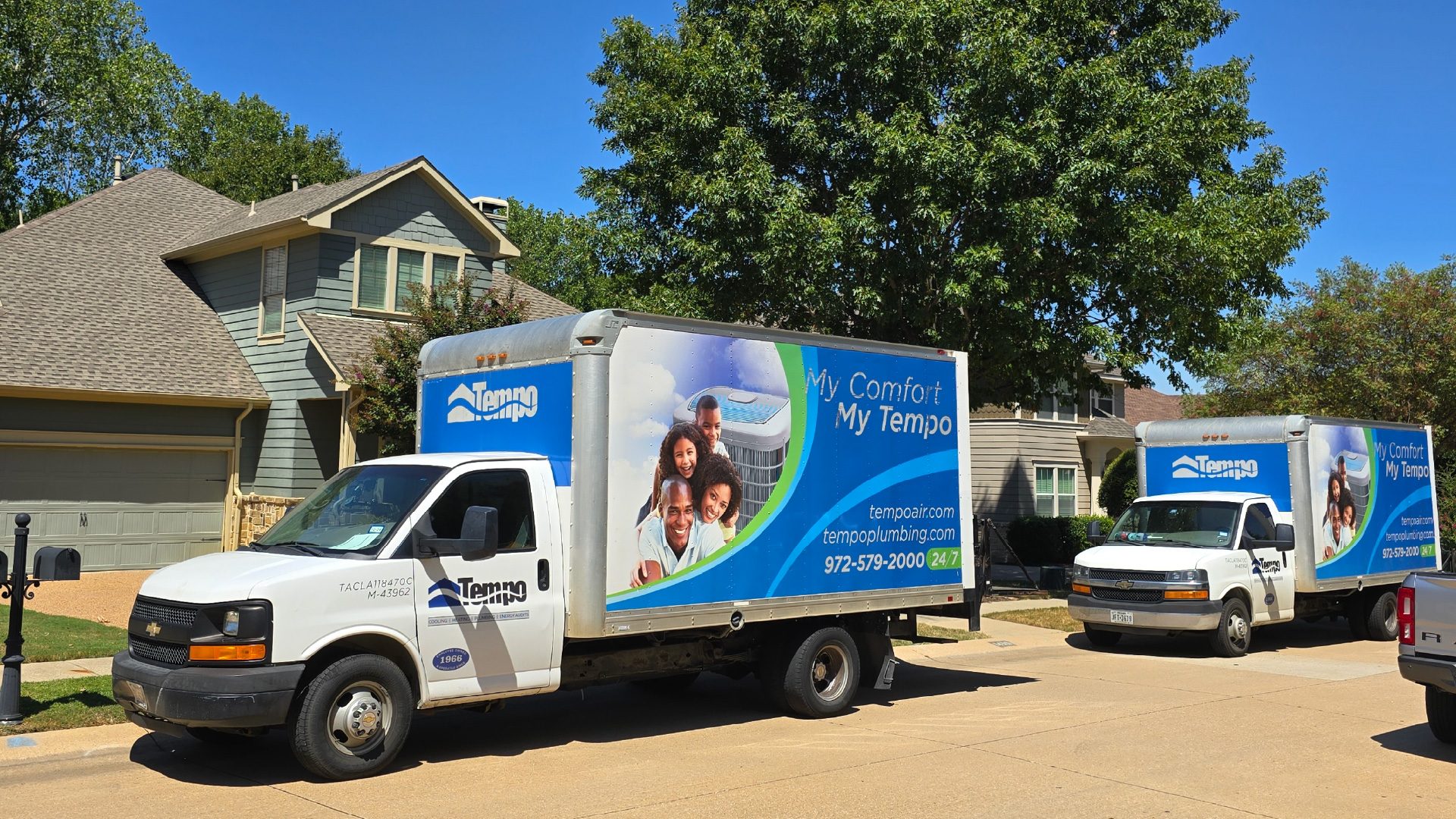 alt="Tempo Air Box Truck in a neighborhood."