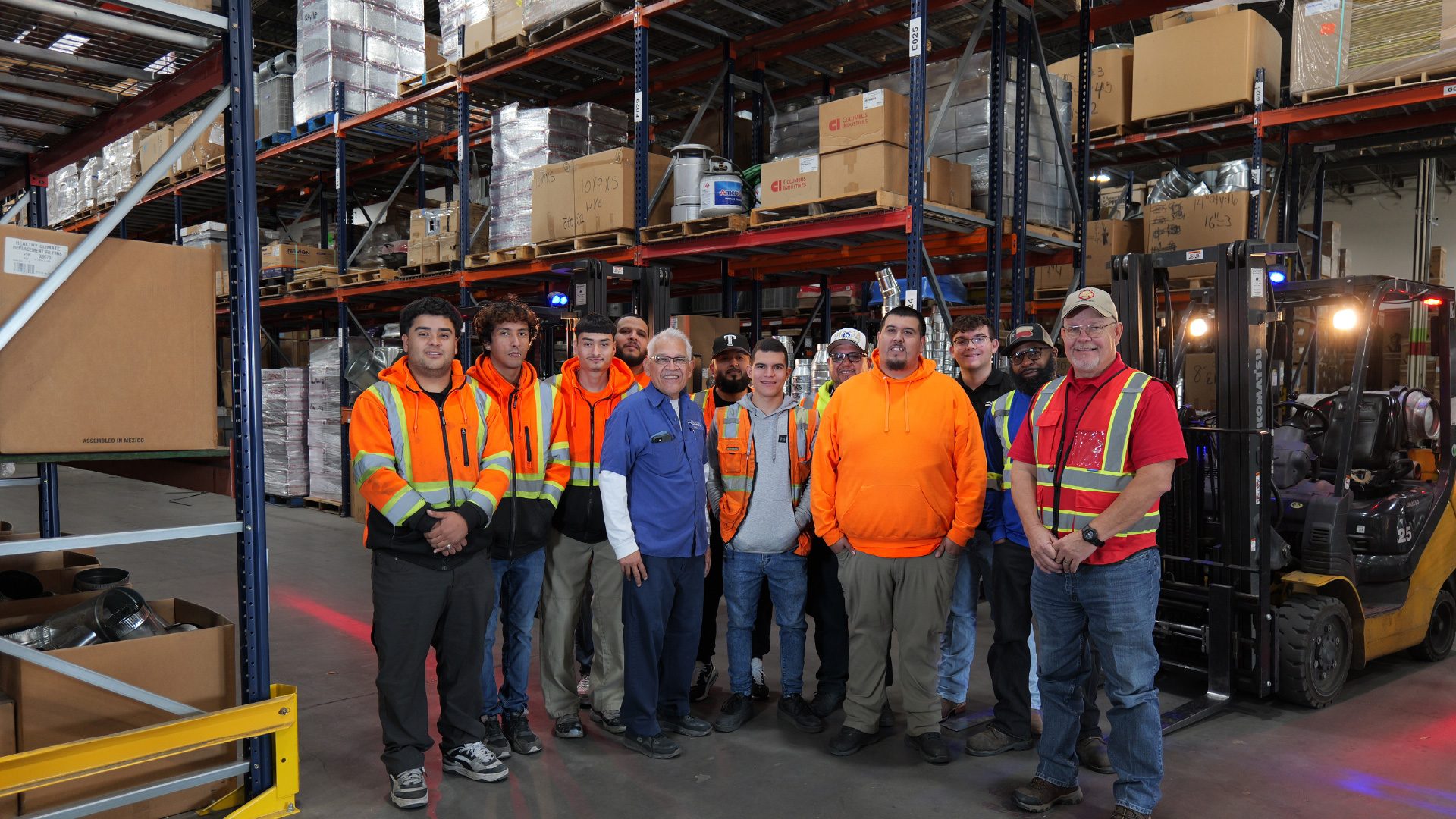 alt="Tempo Air Warehoue Team posing for a photo"